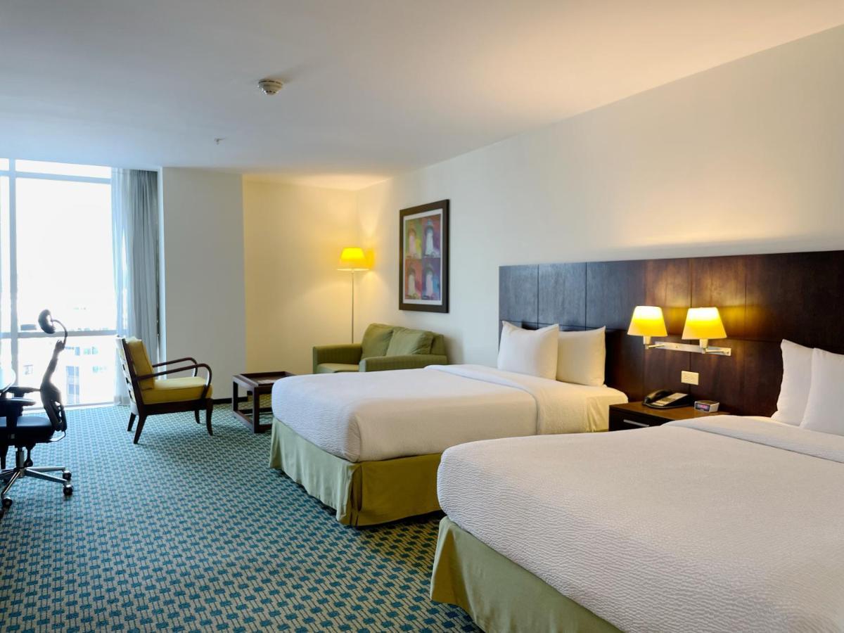 Junior Suite 2 Queen Beds Sofa Bed City View